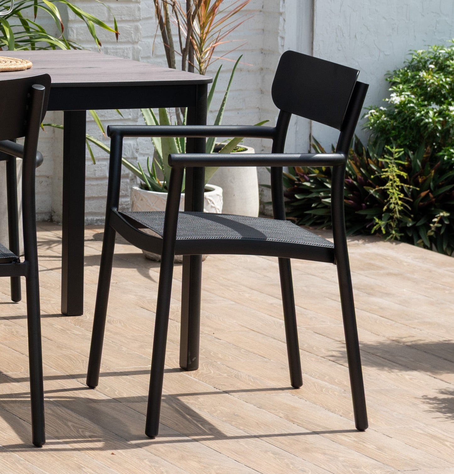 Oje Stackable Black Aluminum Dining Arm Chair